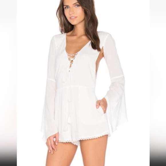 The Jetset Diaries Fit Revolve Lace-up Romper w/ Cut-outs Bell Sleeves White - Picture 1 of 10